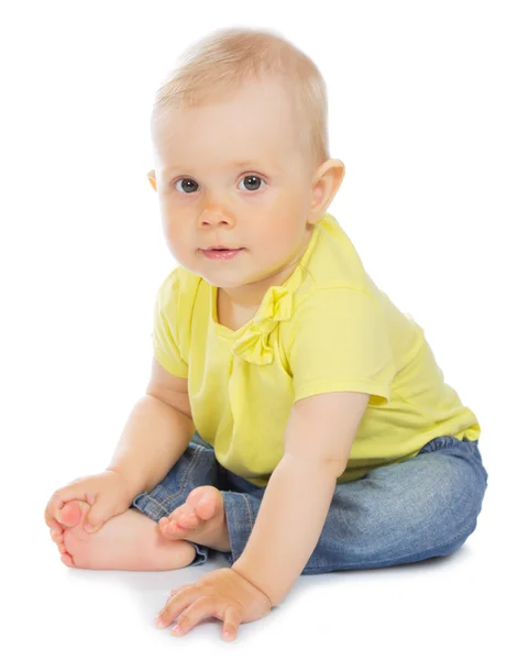 Lilla baby i blå jeans — Stockfoto