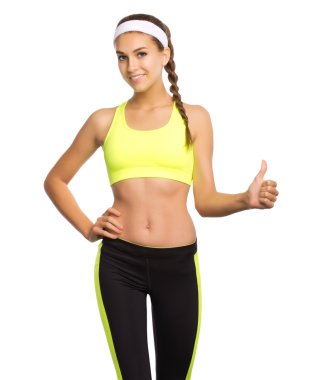 Sportif kız ok jest gösterir