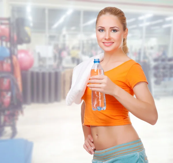 Young woman in fitness club — Stock Photo, Image