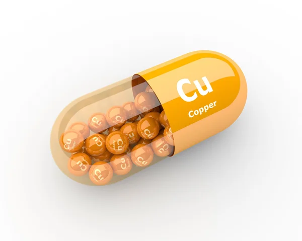 Pílulas com elementos de cobre Cu suplementos nutricionais — Fotografia de Stock