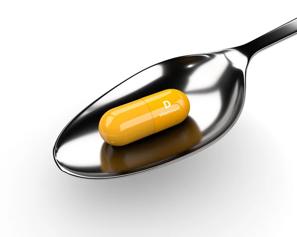 3D D-vitamin piller på sked över vita — Stockfoto