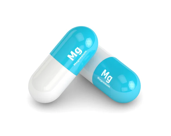 3d representación de píldoras de magnesio sobre fondo blanco — Foto de Stock