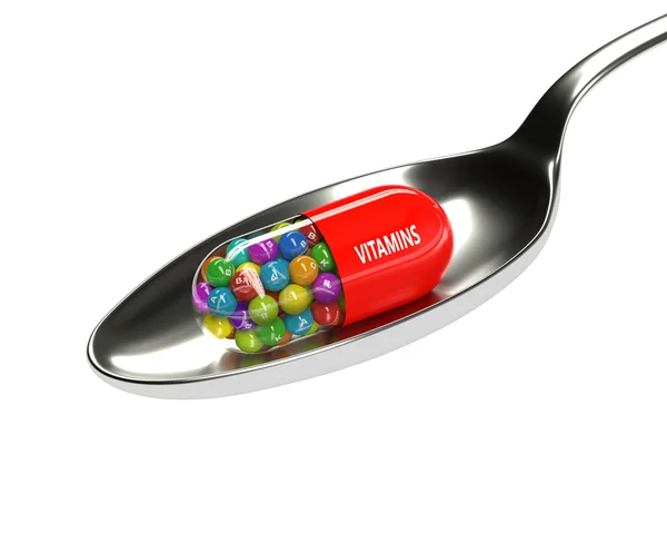 3D-rendering av vitamin piller med granulat på sked — Stockfoto