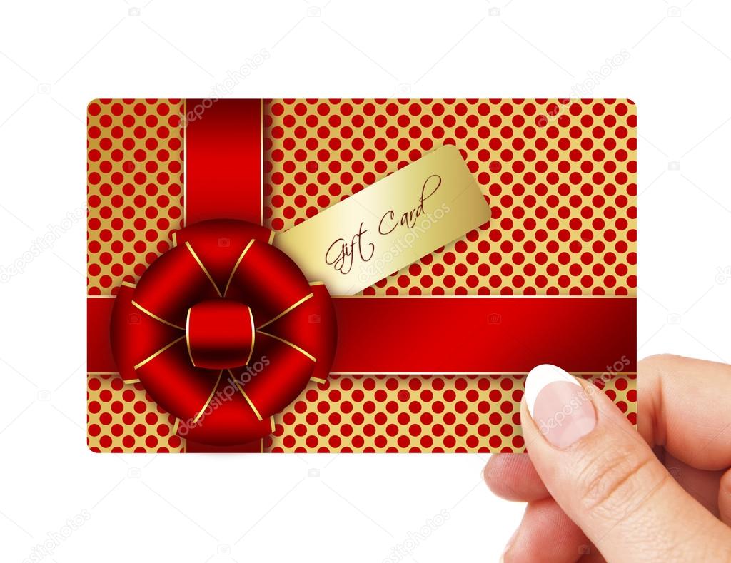 hand holding gift card isolated over white