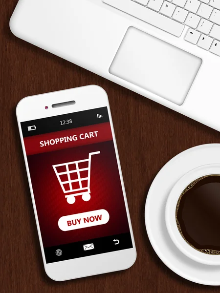 Mobile phone with shopping card page, mug of coffee and laptop k — Stock Photo, Image