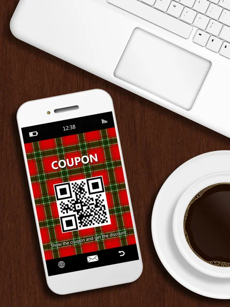 Mobile phone with christmas coupon, mug of coffee and laptop key — Stock Photo, Image