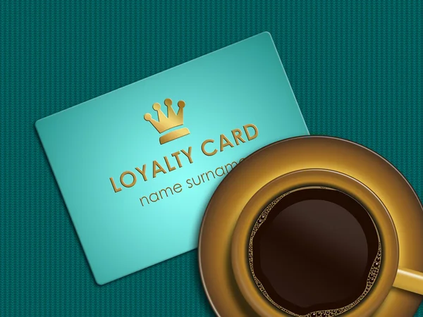 Koffie met loyalty kaart liggen op tafellaken — Stockfoto