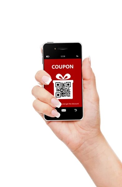 Hand holding mobile phone with christmas coupon isolated over wh — Stock Photo, Image