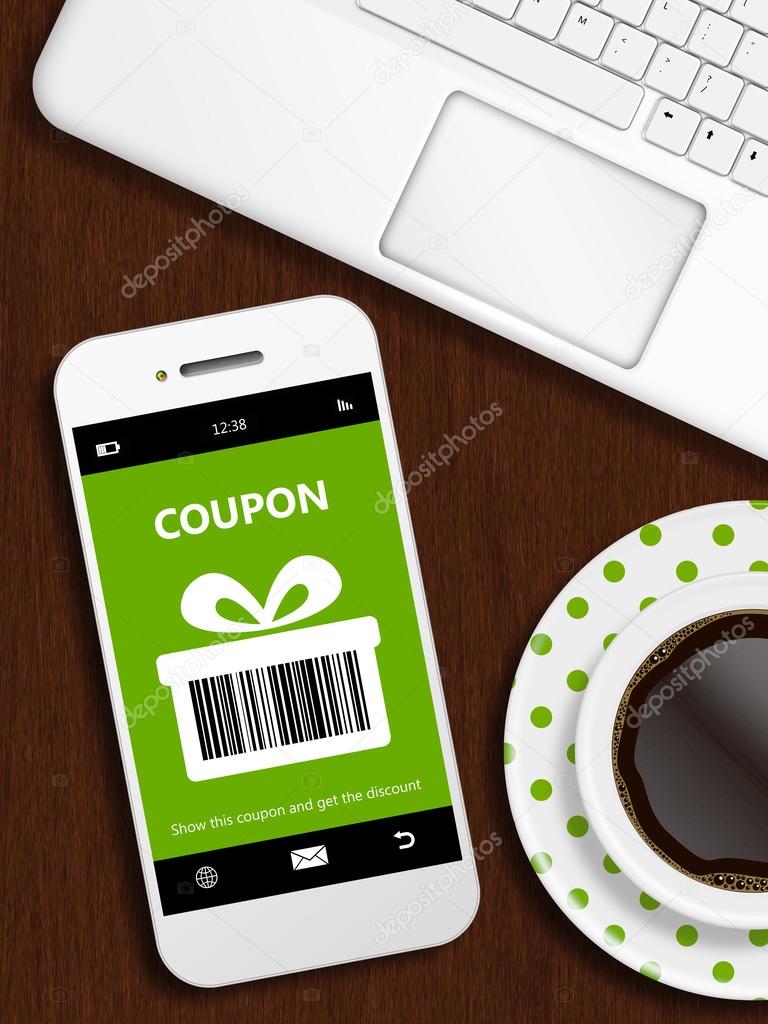 mobile phone with spring discount coupon, laptop and cup of coff