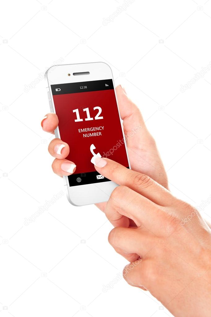 hand holding mobile phone with emergency number 112 isolated ove