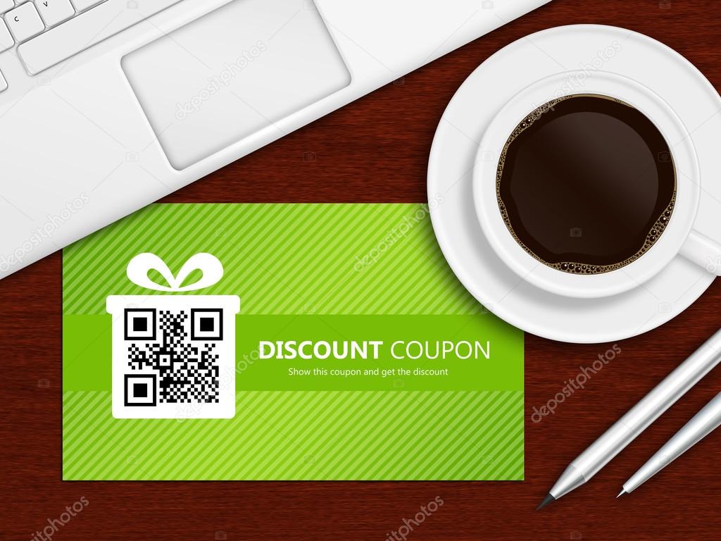 spring discount coupons with laptop and office tools lying on ta