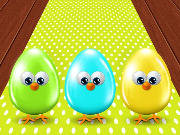 Three colored Easter eggs standing on wooden floor — Stock Photo, Image