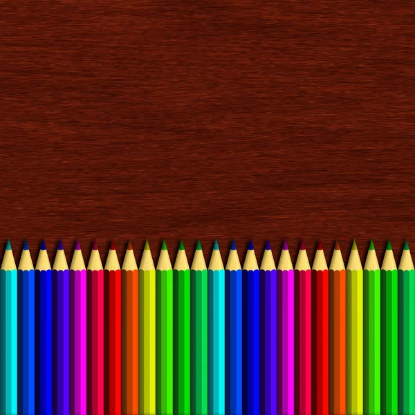 彩色铅笔躺在木桌上 — 图库照片