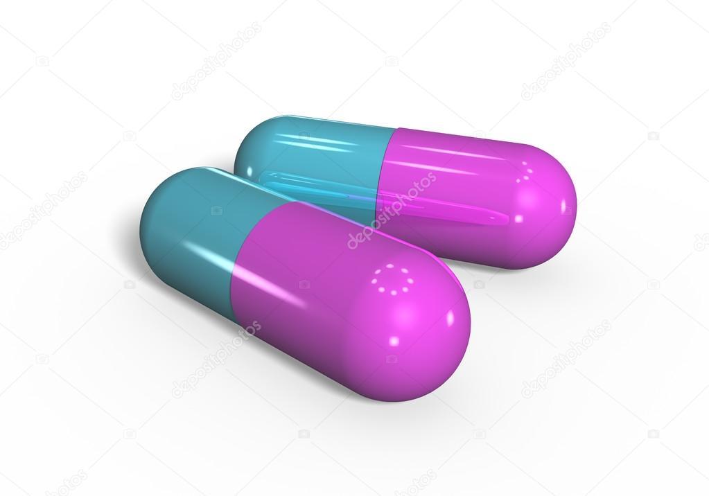 two pills lying on table