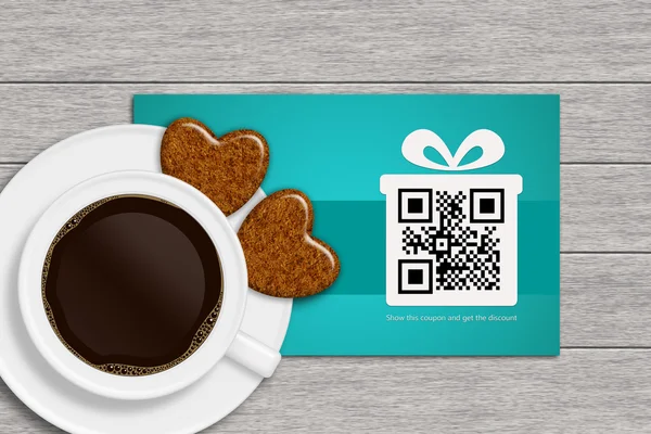 Christmas discound coupons with qr code and coffee on wooden des — Stock Photo, Image