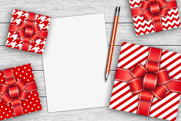 Presents with sheet of paper and pencil — Stock Photo, Image