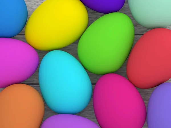 Huevos de Pascua sobre escritorio de madera — Foto de Stock