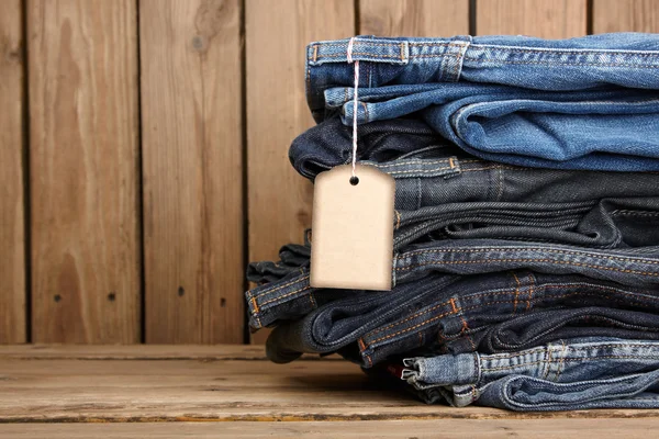 Blue jeans textura y etiqueta de precio — Foto de Stock