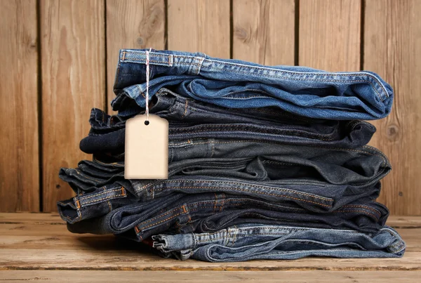 Blue jeans textura y etiqueta de precio — Foto de Stock