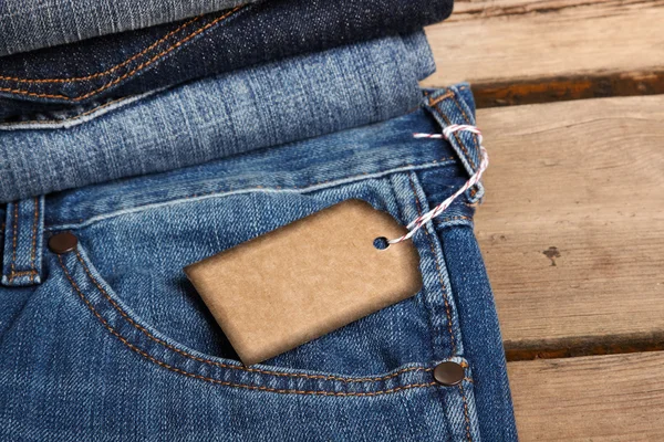 Blå jeans struktur och prislapp — Stockfoto