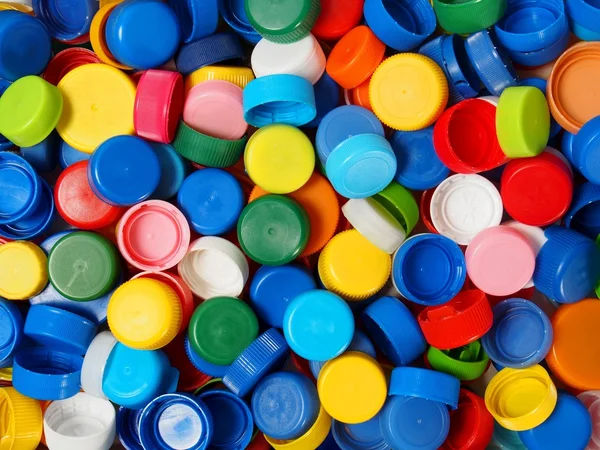 Plastikverschlüsse im Müll — Stockfoto