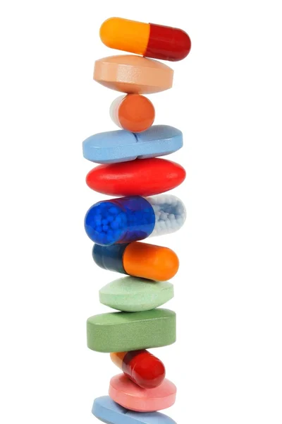 Stacked pills on white — Stock Photo, Image