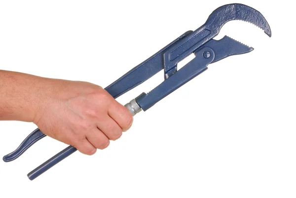 Mão com chave de tubulação ajustável — Fotografia de Stock