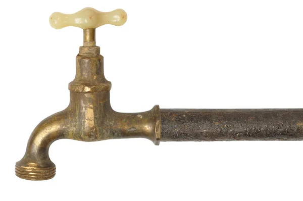 Старый кран и труба — стоковое фото
