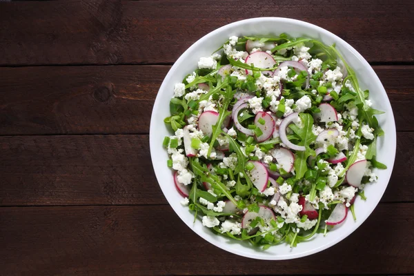 Salad with arugula, cottage cheese, radish and red onion — Stock Photo, Image