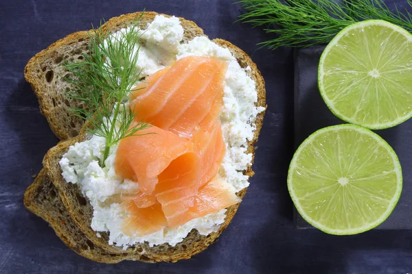 Bread with cottage cheese and smoked salmon Stock Photo