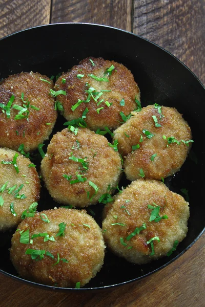 Chicken cutlets in frying pan — Stock Photo, Image