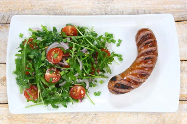 Fried sausage and salad — Stock Photo, Image