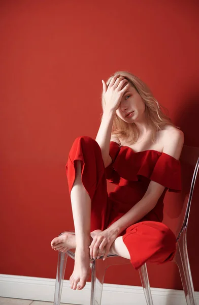 Beautiful Young Adult Woman Wearing Red Jumpsuit Relaxing Chair — Stock Photo, Image