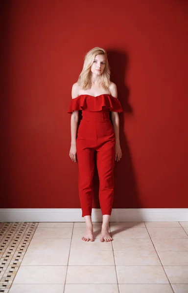 Beautiful Young Adult Woman Wearing Red Jumpsuit Standing Next Wall — Stock Photo, Image