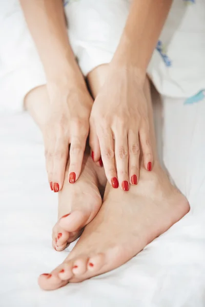 Nohy a ruce ženy — Stock fotografie