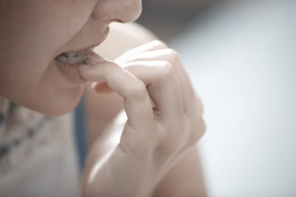 Nail biting. Close-up view — Stock Photo, Image