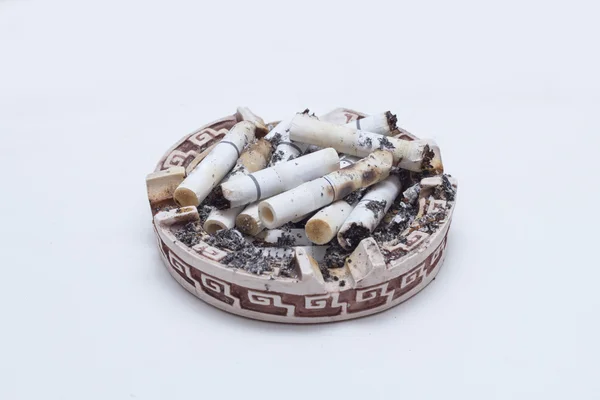 Many cigarettes in an ashtray — Stock Photo, Image