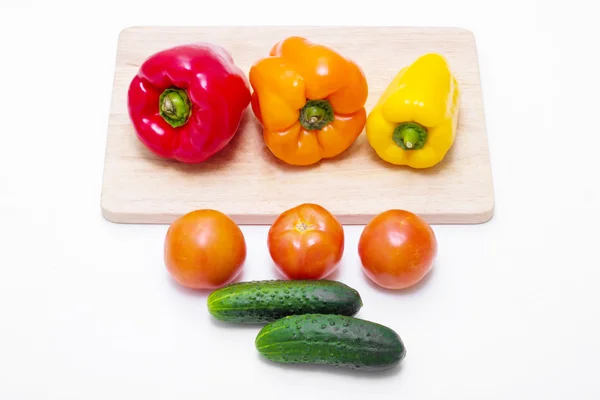 Whole different fresh vegetables on the kitchen table — Stock Photo, Image