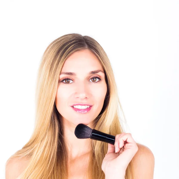 Feliz sonrisa con dientes mujer sosteniendo cepillo para rouge Fotos de stock libres de derechos