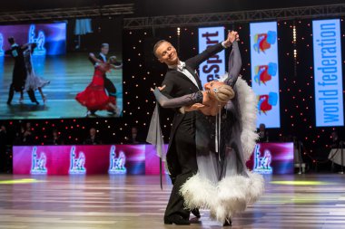 Wroclaw, Poland - May 14, 2016: Evaldas Sodeika and Ieva Zukauskaite in dance pose during World Dance Sport Federation European Championship Standard Dance, on May 14 in Wroclaw, Poland