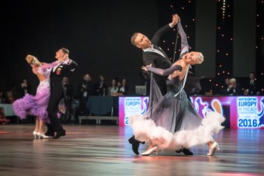 Wroclaw, Poland - May 14, 2016: Evaldas Sodeika and Ieva Zukauskaite in dance pose during World Dance Sport Federation European Championship Standard Dance, on May 14 in Wroclaw, Poland