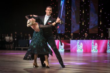 Wroclaw, Poland - May 14, 2016: Bjorn Bitsch and Ashli Williamson in dance pose during World Dance Sport Federation European Championship Standard Dance, on May 14 in Wroclaw, Poland