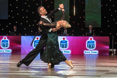 Wroclaw, Poland - May 14, 2016: Bjorn Bitsch and Ashli Williamson in dance pose during World Dance Sport Federation European Championship Standard Dance, on May 14 in Wroclaw, Poland