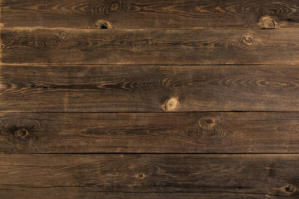 Гранж фон из старой коричневой деревянной доски. Горизонтальные полосы