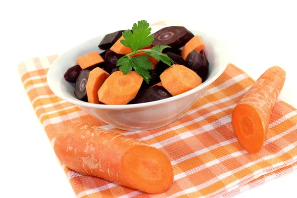 Orange und violette Karotten mit glatter Petersilie — Stockfoto