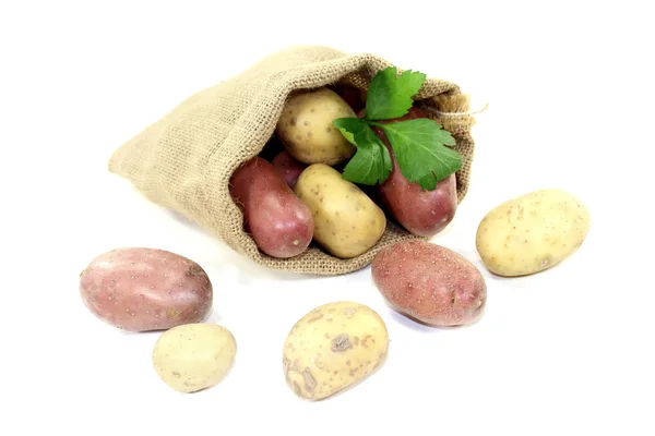 Potatoes in a sack — Stock Photo, Image