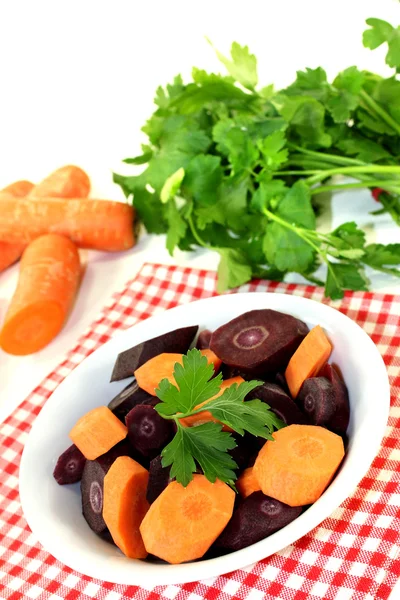 Colorful carrots with parsley — Stock Photo, Image