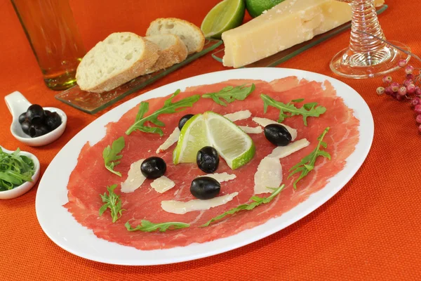 Carpaccio with lime — Stock Photo, Image