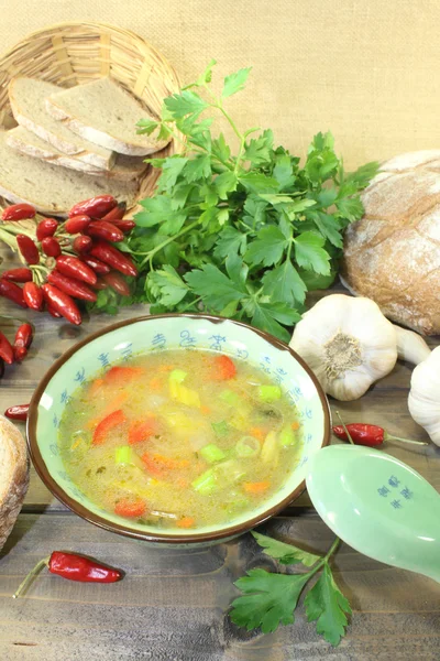 Asian chicken consomme with parsley — Stock Photo, Image