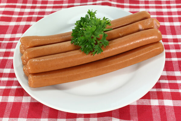 stacked Wiener sausages with parsley